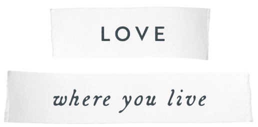 the words "love where you live" on white paper cutouts