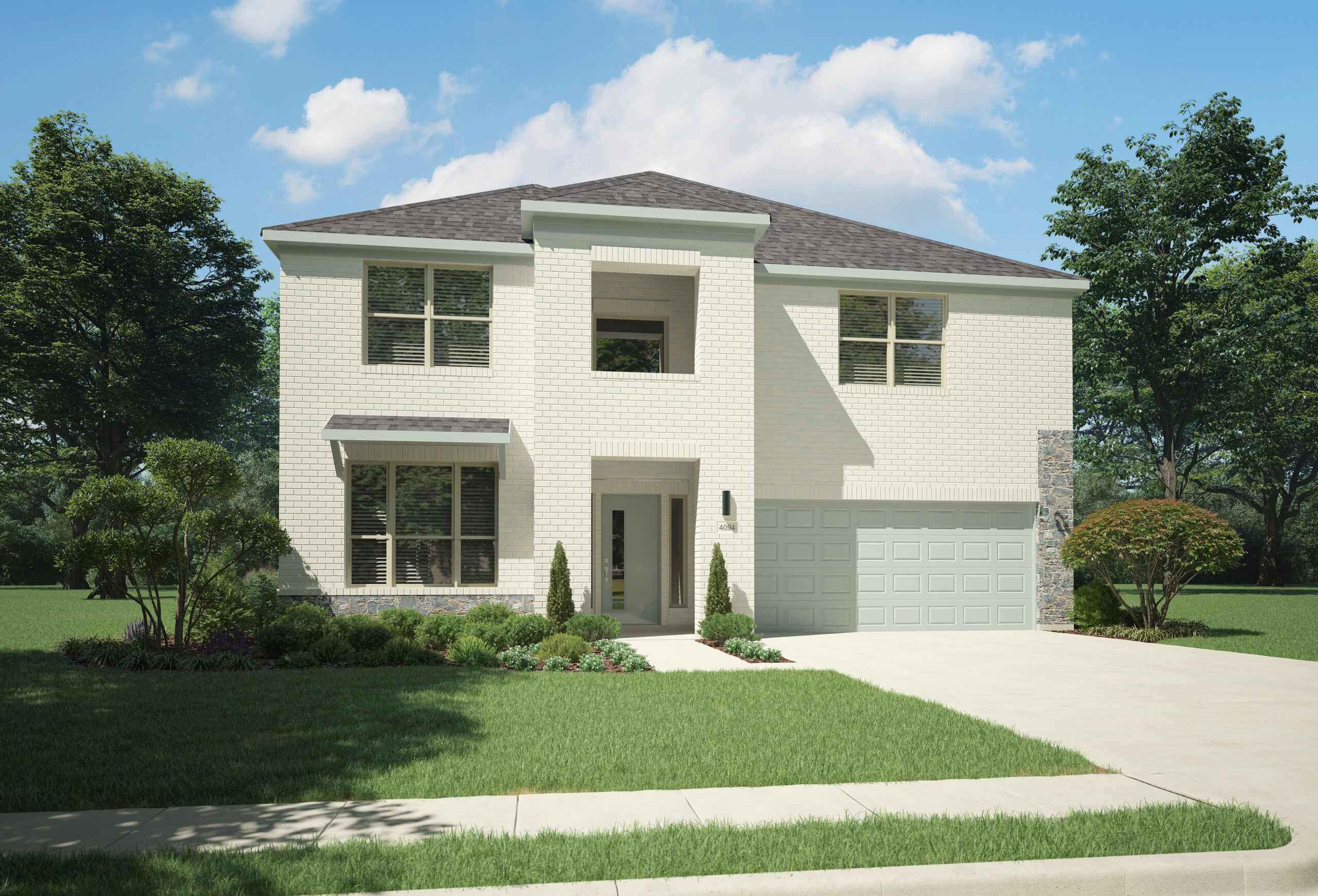 This two-story modern house in McKinney, TX, boasts a white brick exterior, large windows, and a grey roof. A driveway leads to a double garage. The front yard of this new home is landscaped with bushes and trees set against a clear sky.