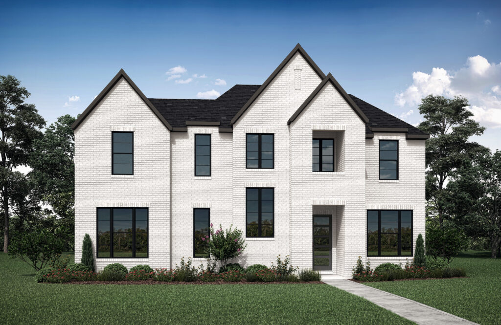 A two-story white brick house with a dark roof, large windows, and a landscaped front yard sits under the blue Texas sky in Painted Tree's new homes development in McKinney.