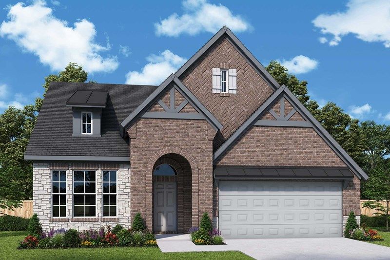 A single-story brick house with a gabled roof, arched entryway, two-car garage, and large windows sits on a landscaped front yard under a blue sky—one of the charming homes for sale in Painted Tree McKinney, Texas.