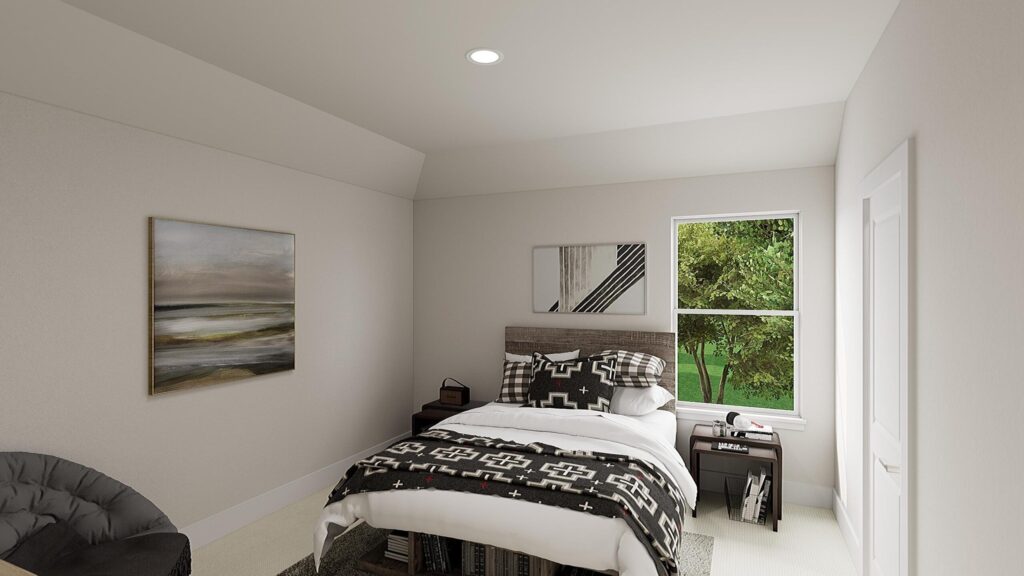 A small bedroom in Painted Tree McKinney with a single bed, geometric-patterned bedding, a side table, chair, two wall art pieces, and a window overlooking green trees—perfect for those exploring homes for sale in McKinney, Texas.