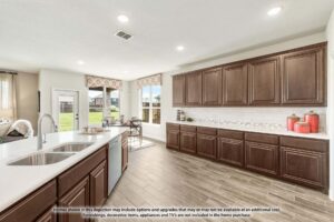 Modern kitchen with brown cabinets, white countertops, double sink, large windows, and stainless steel appliances overlooking a backyard and dining area—perfect for those seeking homes for sale in McKinney Texas within Painted Tree.