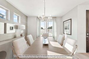 Modern dining room with a rectangular table, six chairs, a chandelier, and large windows letting in natural light; perfect for gatherings in Painted Tree McKinney. Disclaimer text displayed at the bottom.