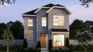 Two-story brick house with large windows and wood front door in Painted Tree, McKinney. Features a small front yard with shrubs and flowers, fenced backyard, all beautifully lit at dusk—perfect for those seeking new homes.