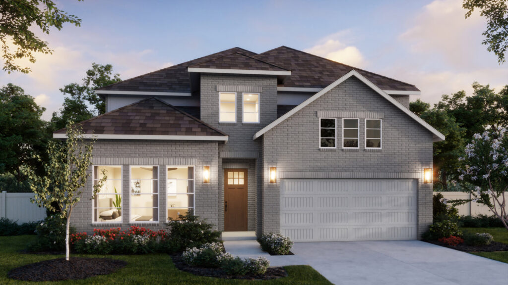 Two-story suburban house with gray brick exterior, double garage, front lawn, and large windows—this Normandy Homes gem in Painted Tree glows warmly at dusk, showcasing the appeal of new homes in a welcoming community.